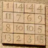 A photograph of Josep Subirachs magic square on the Sagrada Familia cathedral, Barcelona